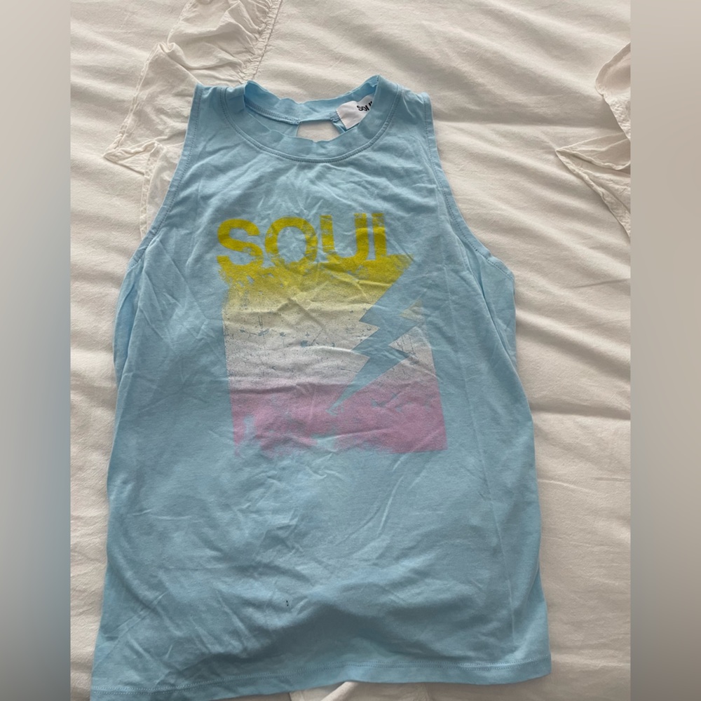 Open back blue soulcycle tank